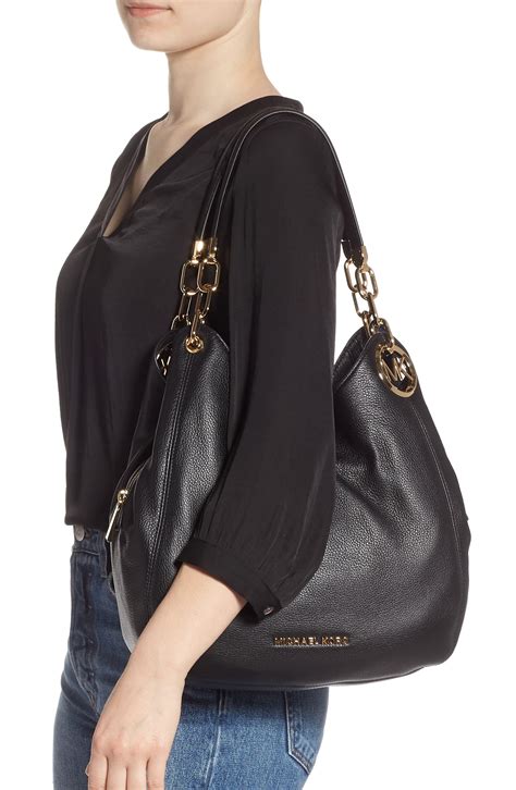 michael kors black shoulder bag.